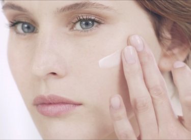 Bioderma - woman applying cream on the face